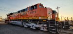 BNSF 6111 in The Shadows of The Setting Sun Shows Off Her 25th BNSF Anniversary Paint Scheme. 